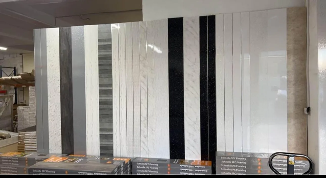 A room filled with lots of white and black striped walls.