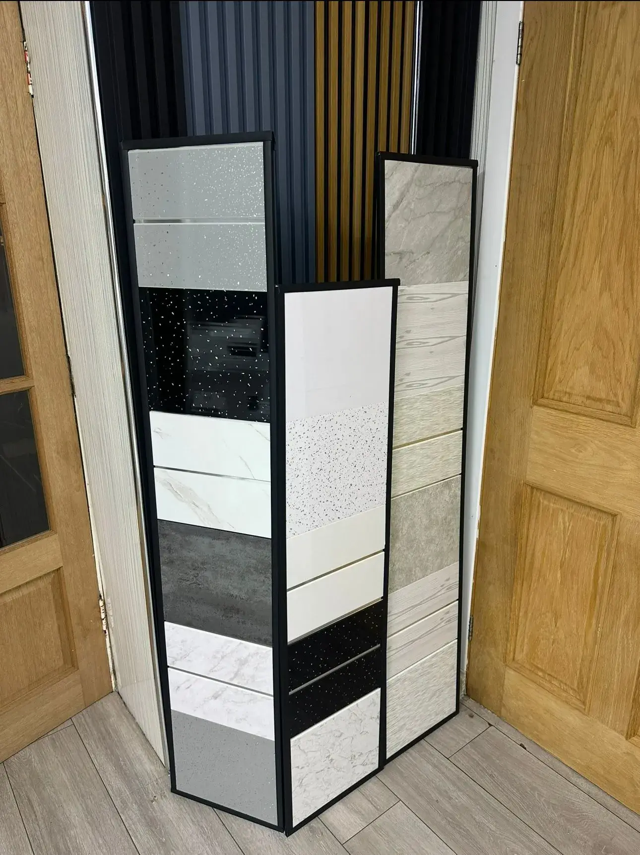 A room divider made out of different materials.